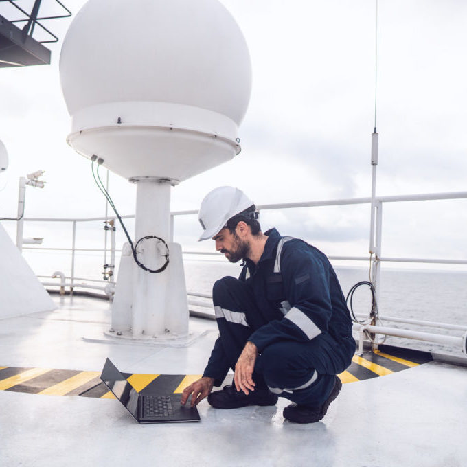 Service technician or serviceman near VSAT terminal